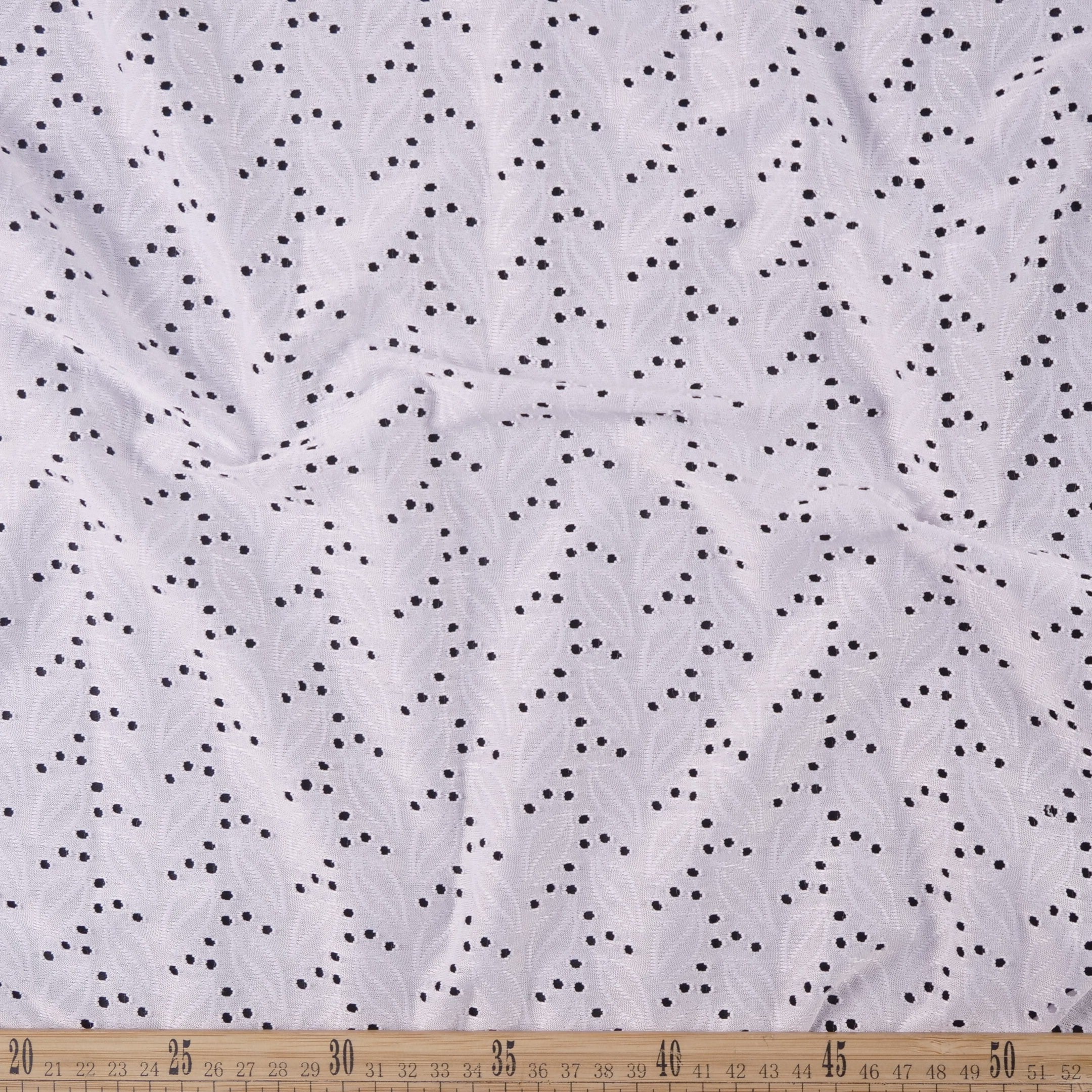 BRODERIE SPANDEX BLANCO AZULADO HOJAS