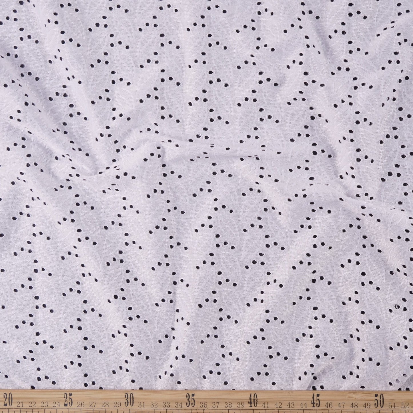 BRODERIE SPANDEX BLANCO AZULADO HOJAS