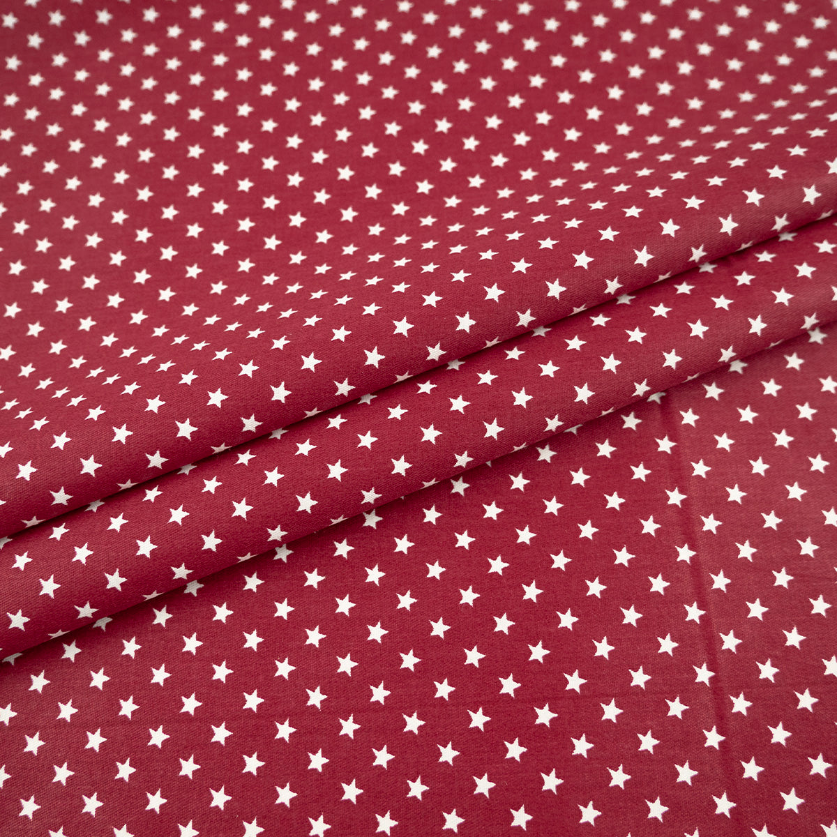 DRIL NAVIDAD BORDO VINO RUBY ESTRELLITAS