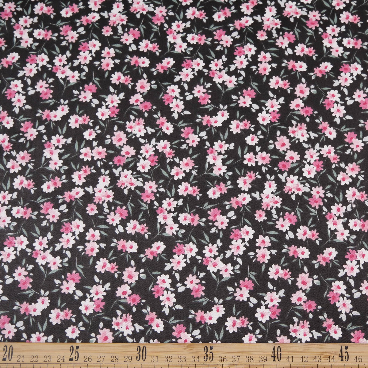 DRIL DACA ESTAMPADO NEGRO METEORITO FLORAL ROSA Y FUCSIA