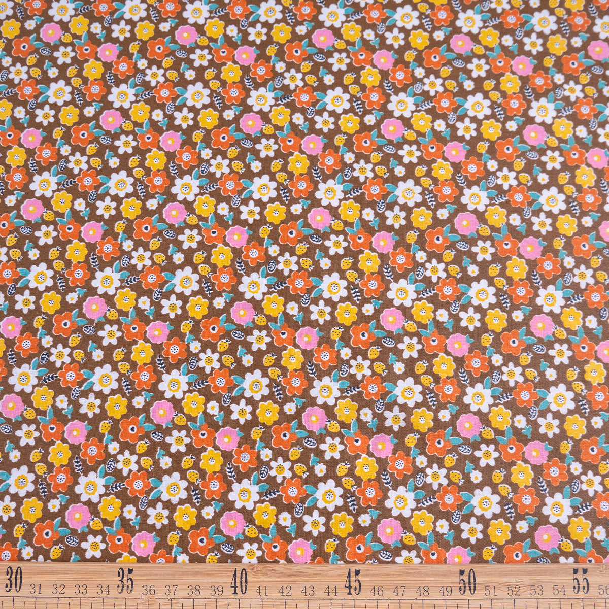 POPLIN DEEP ESTAMPADO MARRON CUERO FLORAL COLORIDO