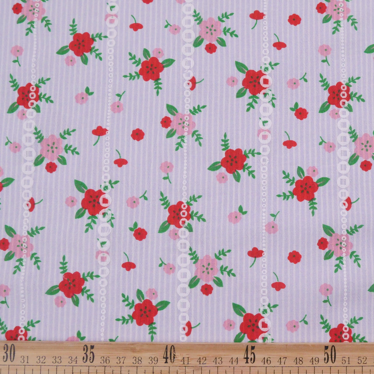 POPLIN CELINA AZUL ALAS FLORAL ROJO Y ROSA
