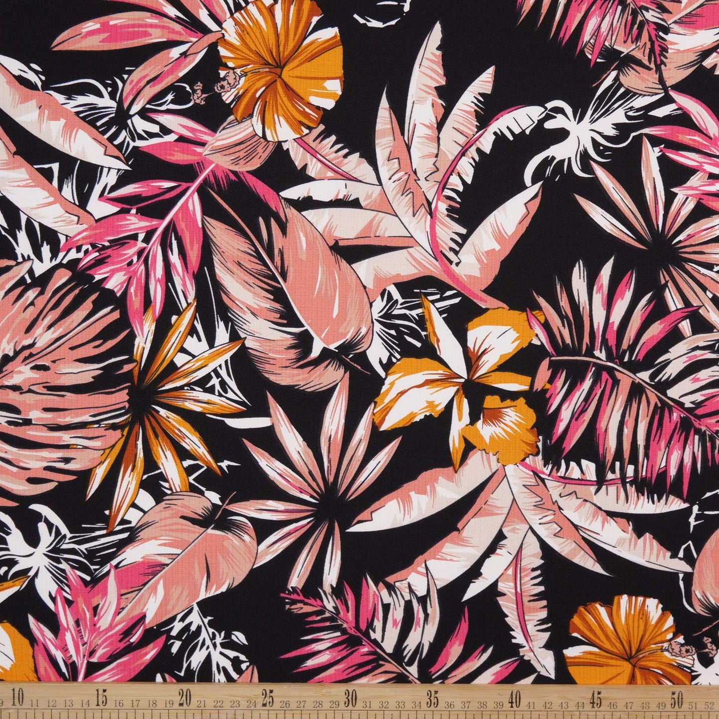 FIBRANA LINO ESTAMPADO NEGRO METEORITO HOJAS EN NARANJA, CORAL Y FUCSIA