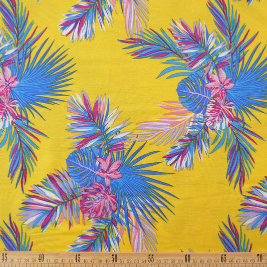 FIBRANA CREPE ESTAMPADA AMARILLO SPECTRA TROPICAL CON HOJAS AZULES Y FLORES FUCSIAS