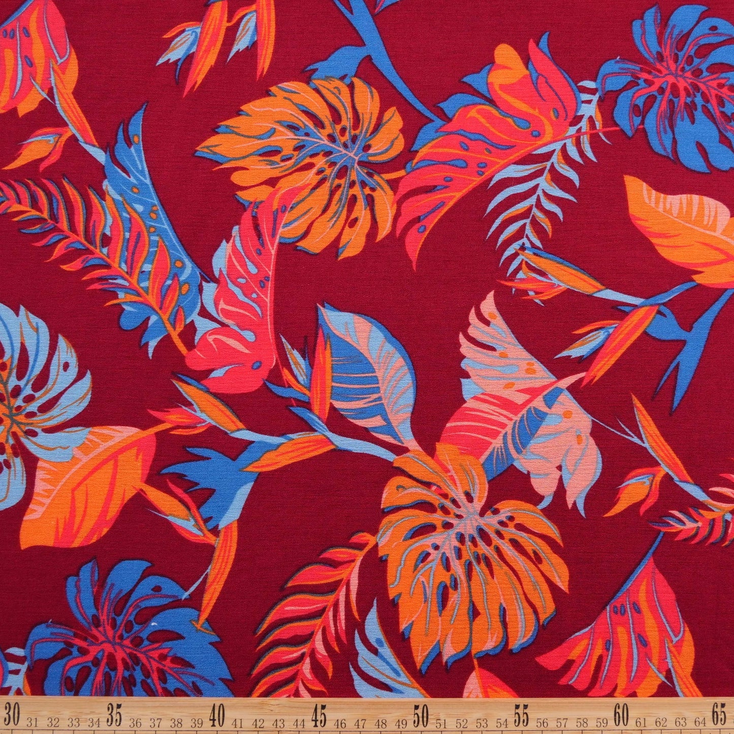 FIBRANA CREPE ESTAMPADA ROJO BARBADOS HOJAS CON COLORES VIBRANTES