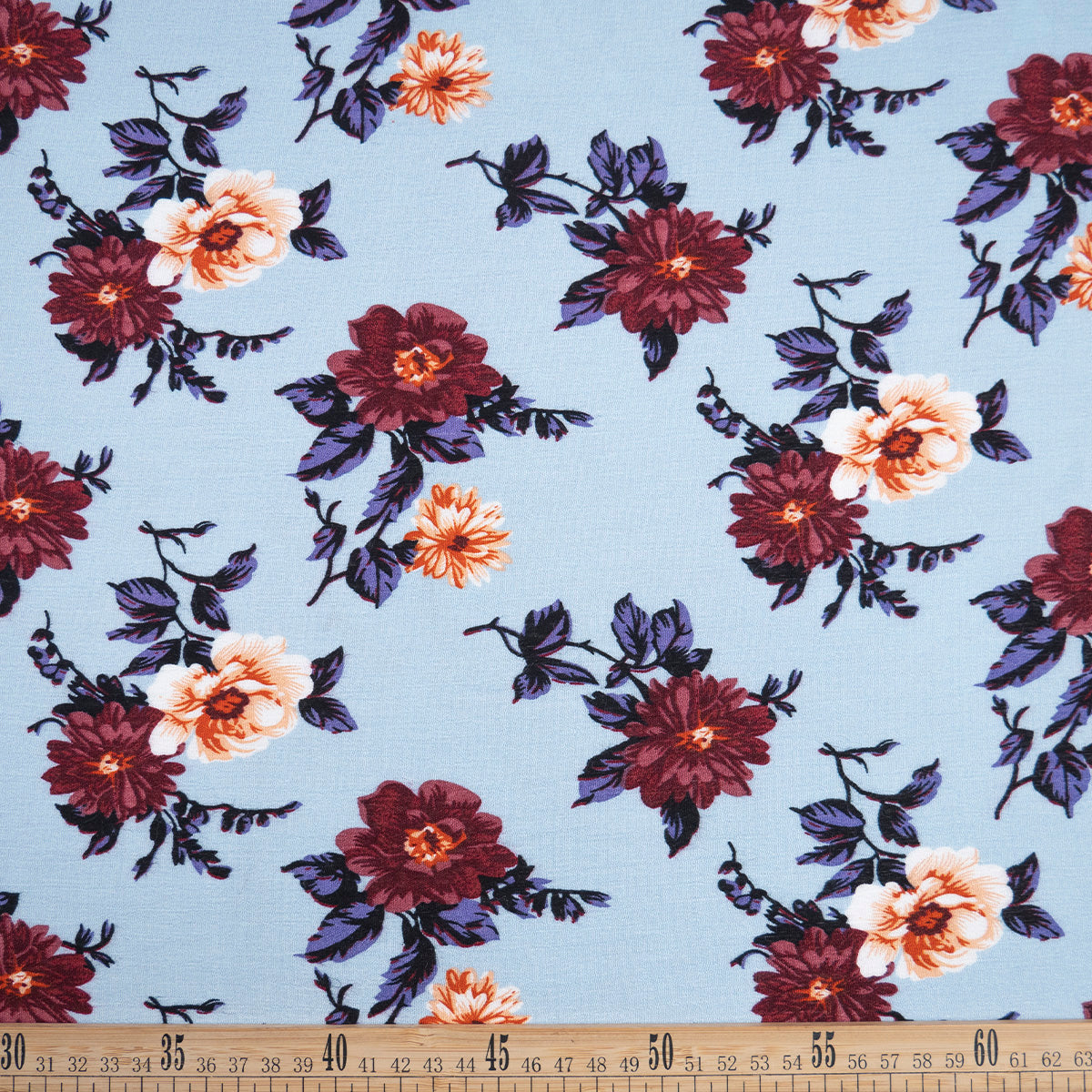 FIBRANA CREPE ESTAMPADA CELESTE POLVO FLORAL BORDO Y BEIGE