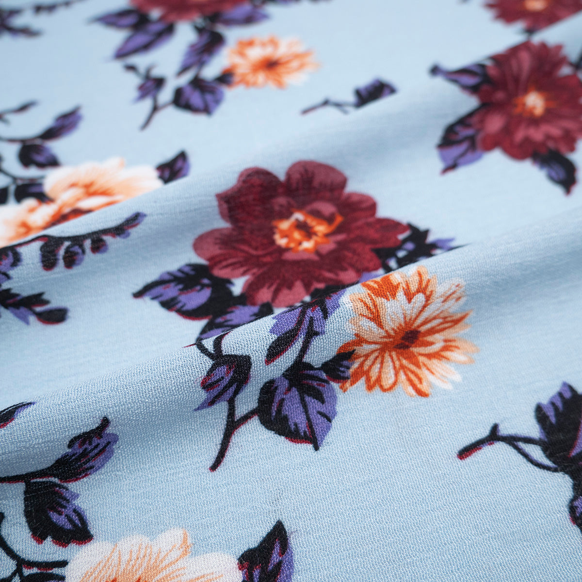 FIBRANA CREPE ESTAMPADA CELESTE POLVO FLORAL BORDO Y BEIGE