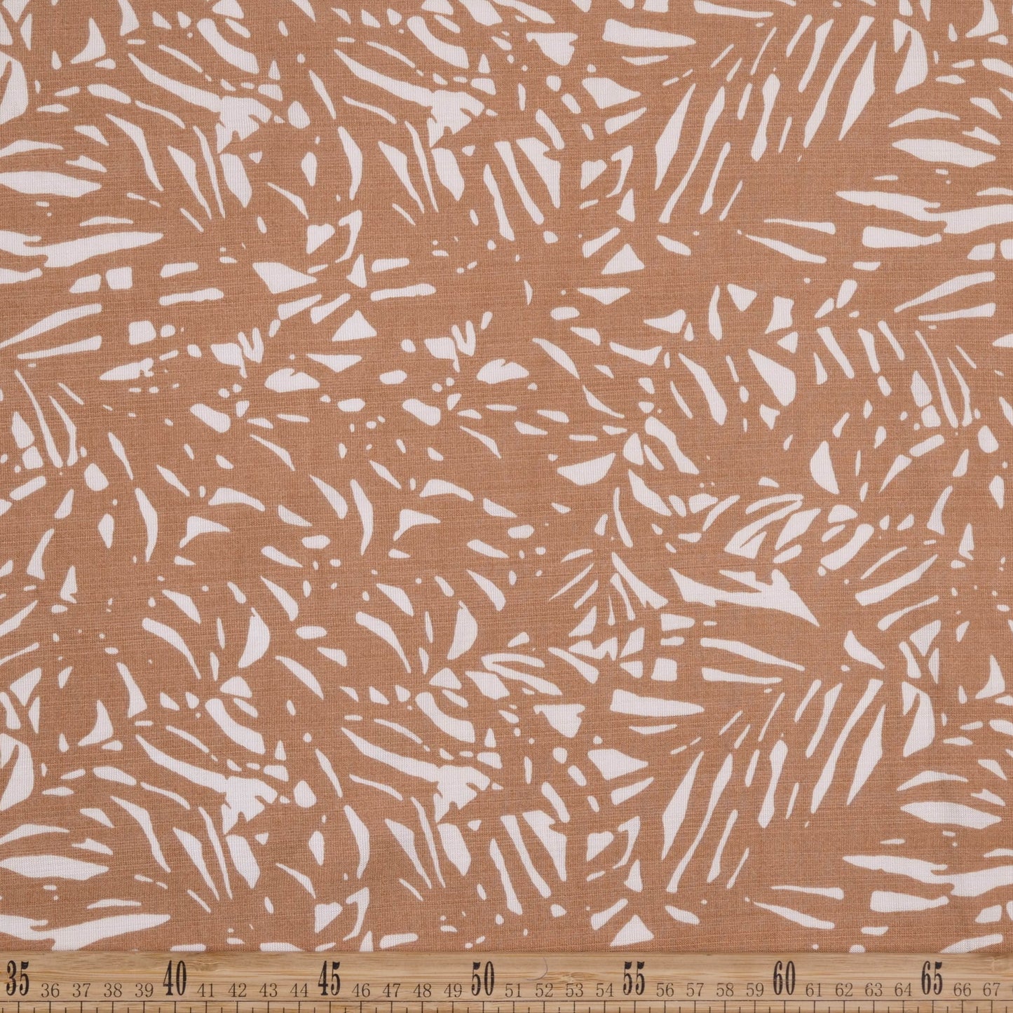 POPELINA RANY ESTAMPADO MARRON TABACO TROPICAL HOJAS DE PALMERA